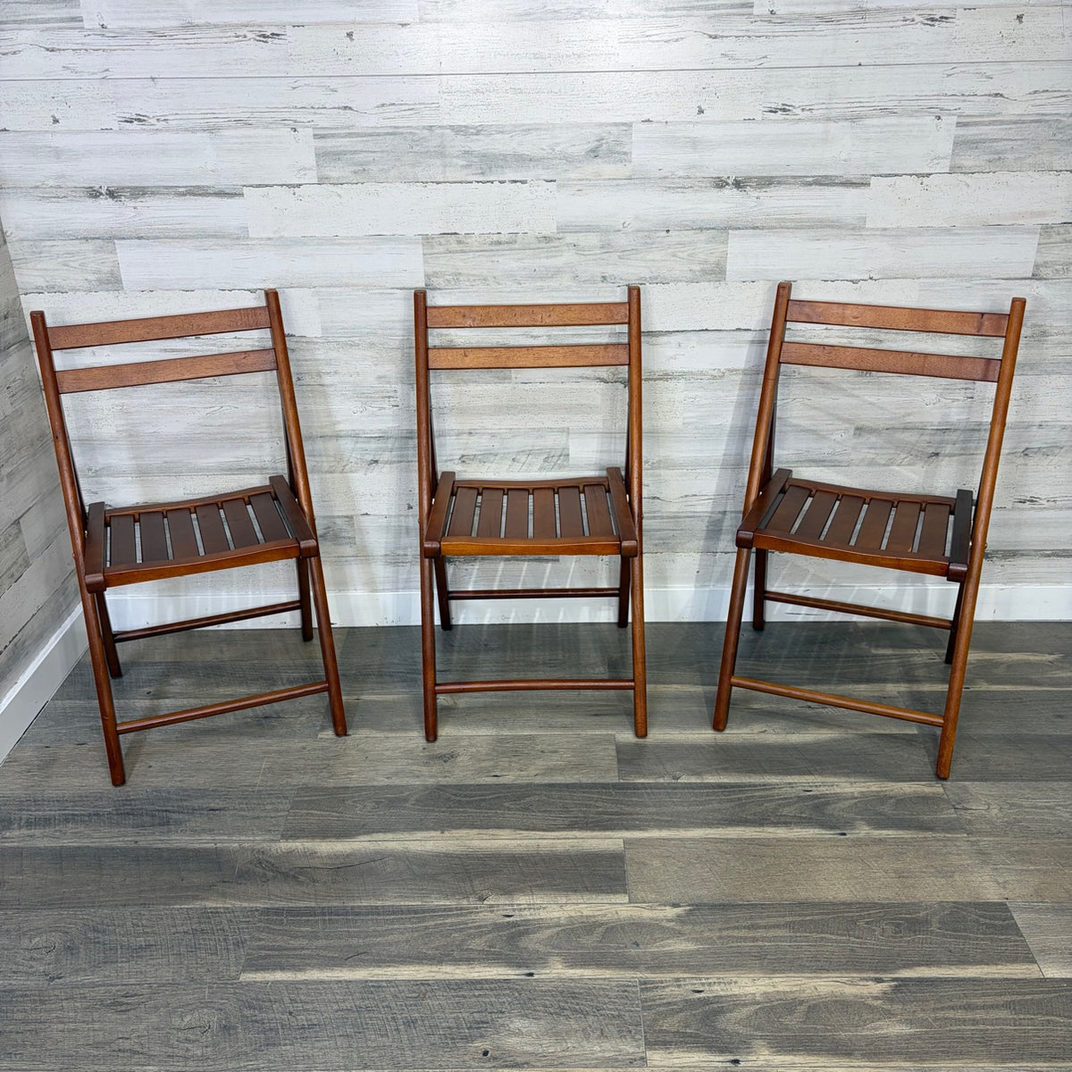 Set of 3 World Market folding chairs - front view