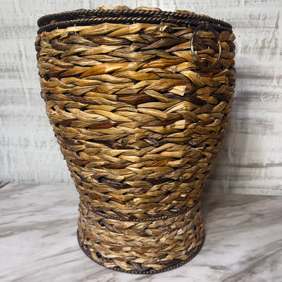 Woven storage basket with lid, front view