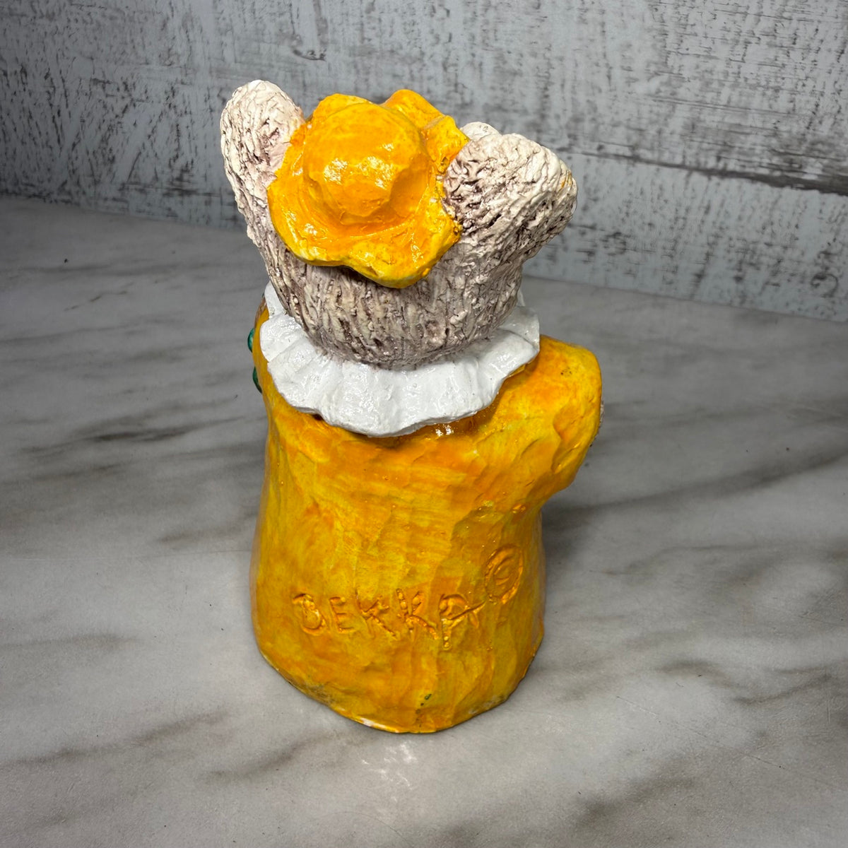 Bekka bear figurine, back with stamp