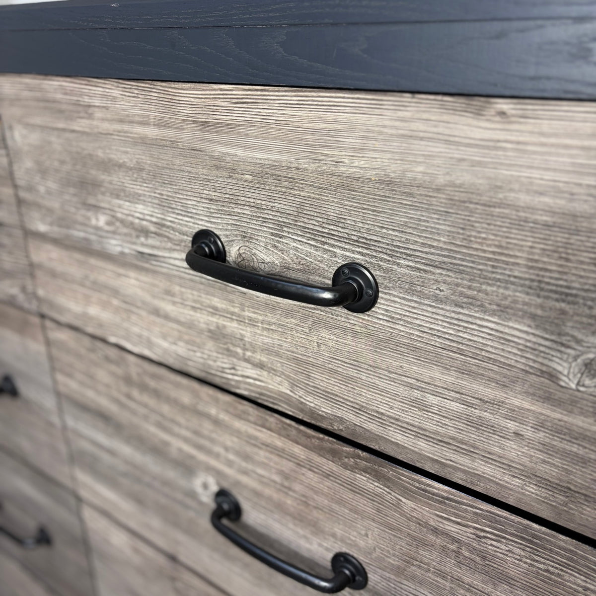 Close-up of black bar pulls