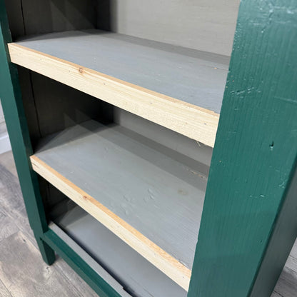 Green refinished bookshelf shelf detail