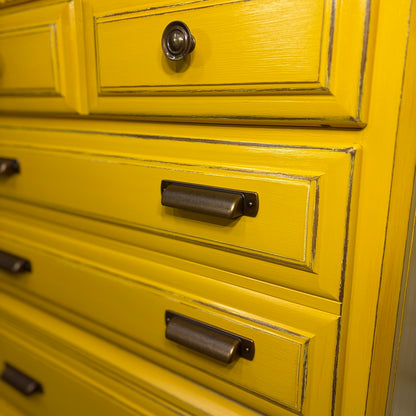 Close-up of drawers and bronze cup pulls