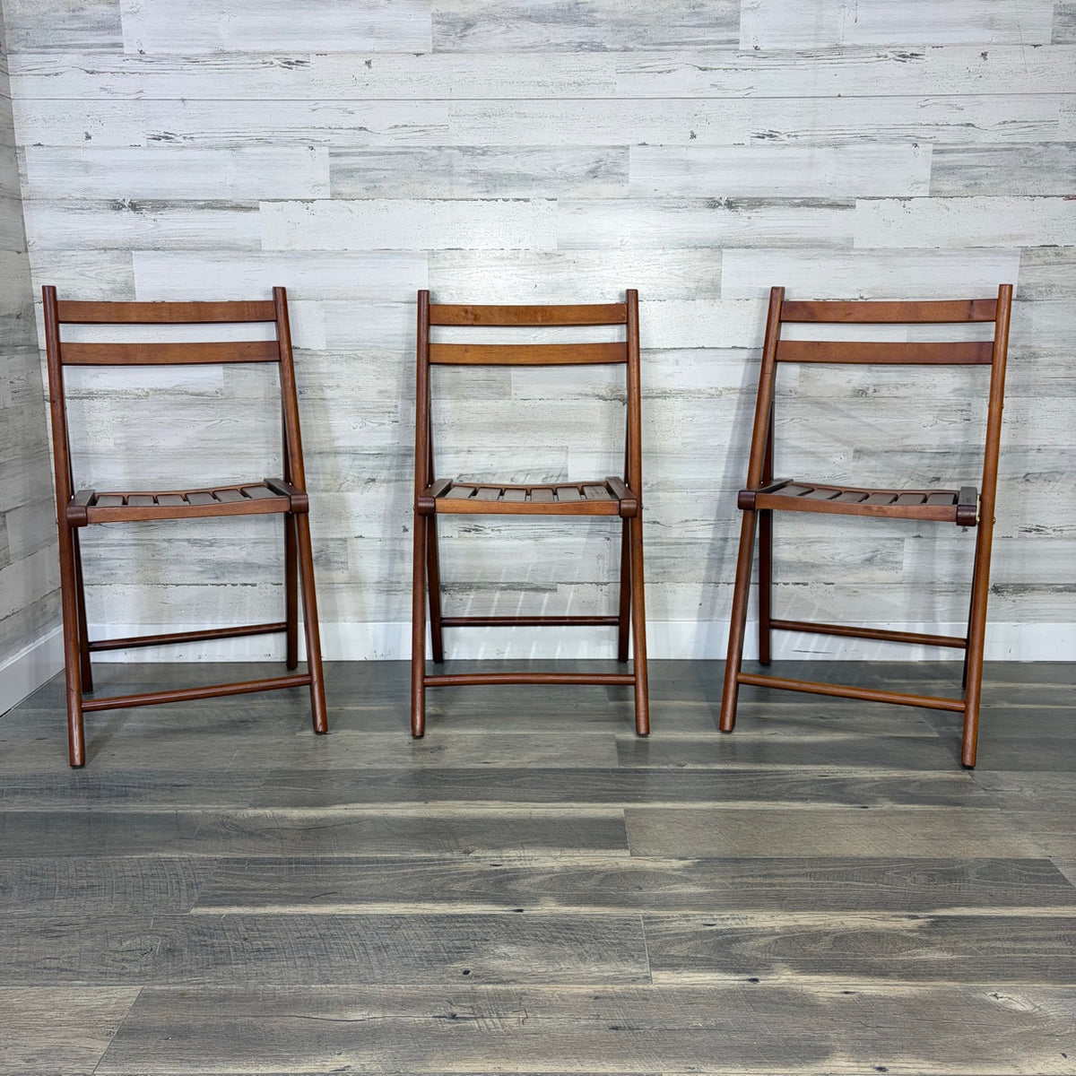 Set of 3 World Market folding chairs - front view