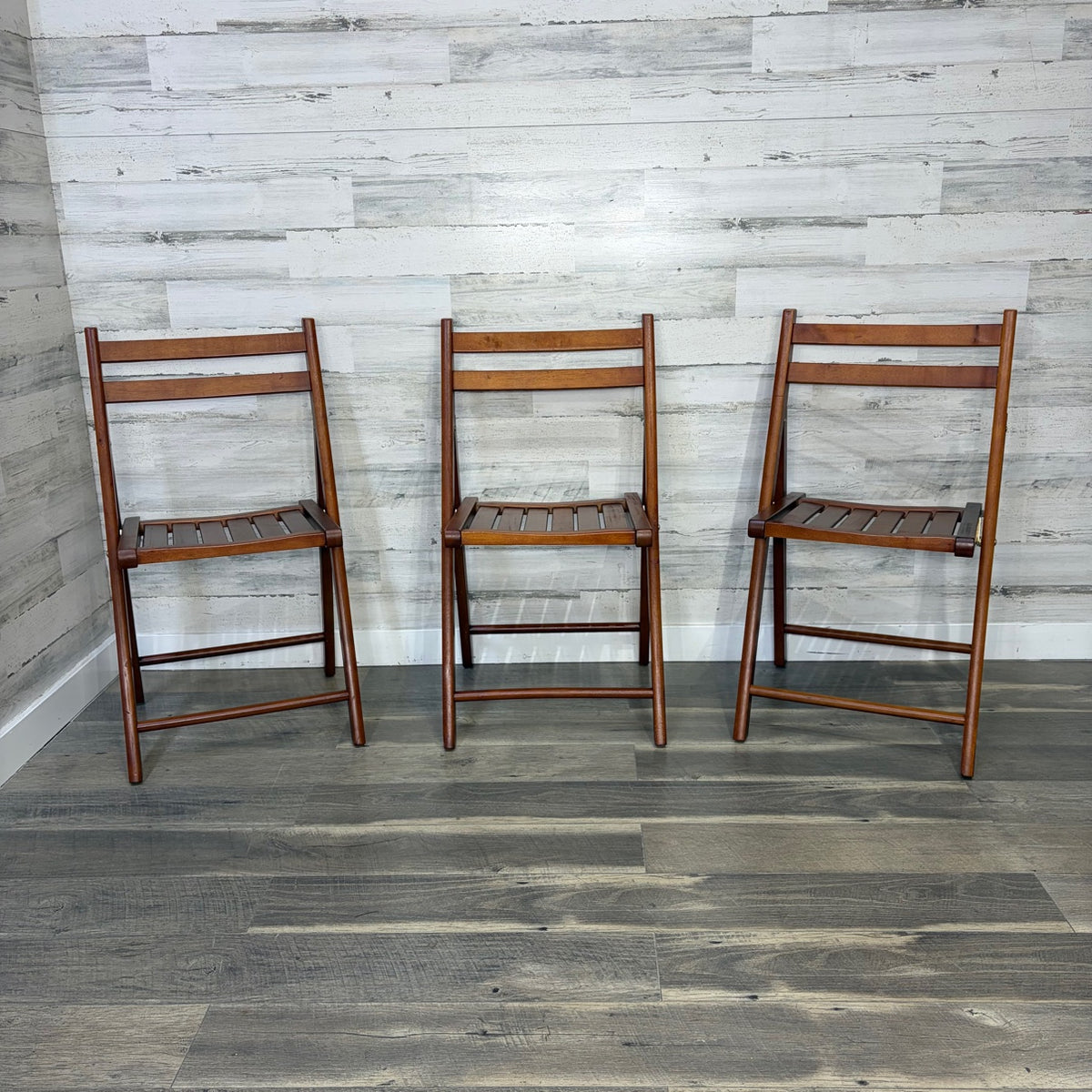 Set of 3 World Market folding chairs - front view