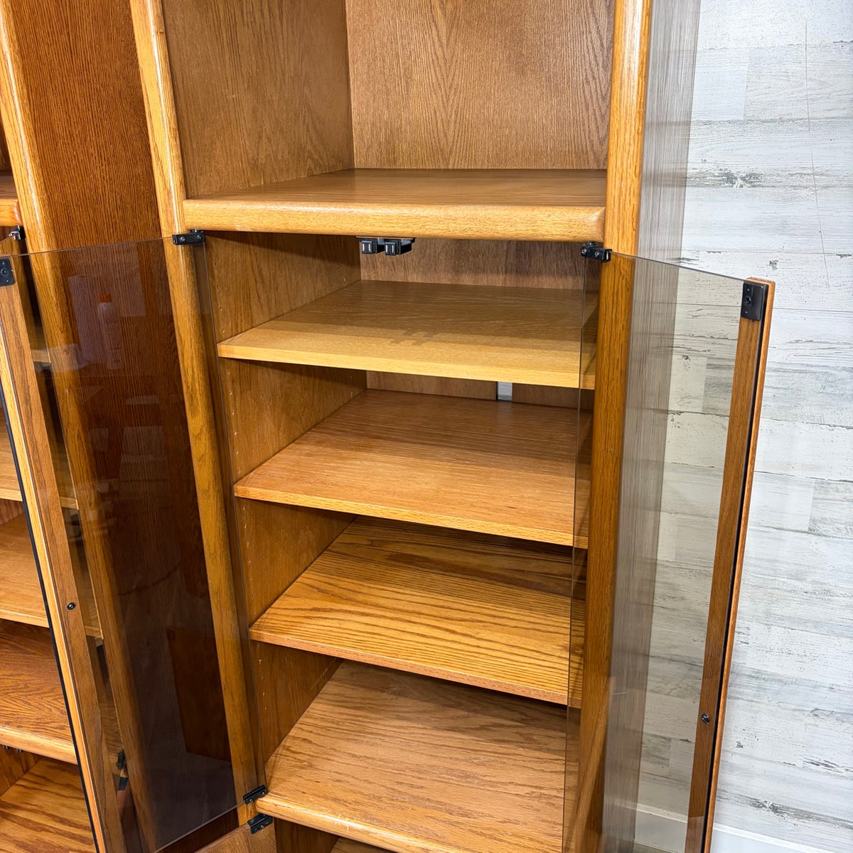 open cabinet showing adjustable shelves