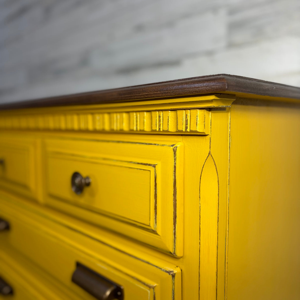 Close-up of stained top edge and trim detail