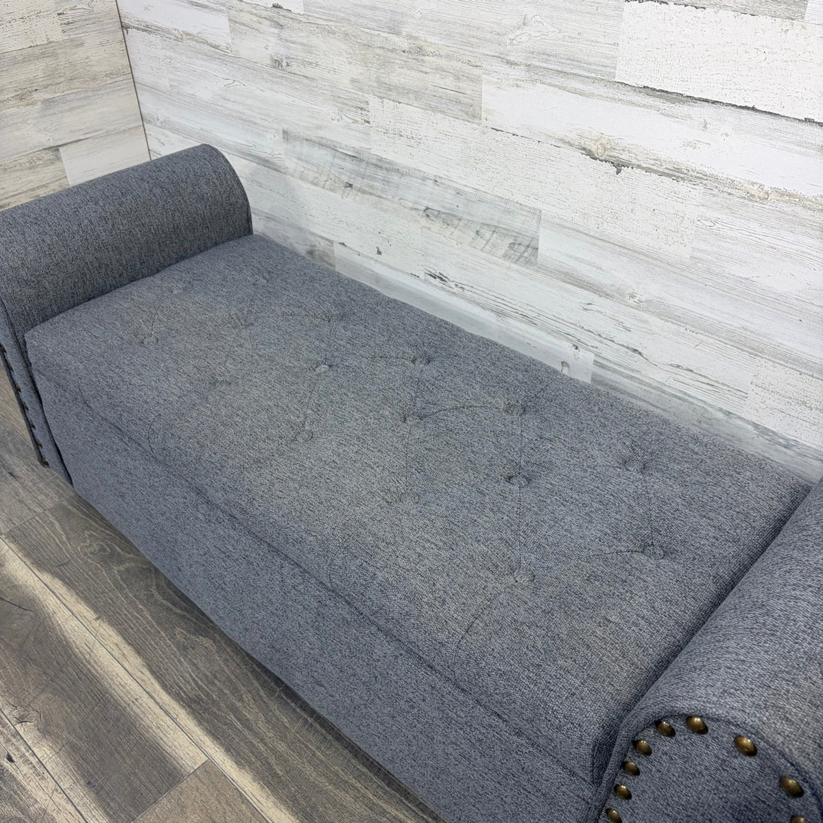 Close-up of tufted bench cushion
