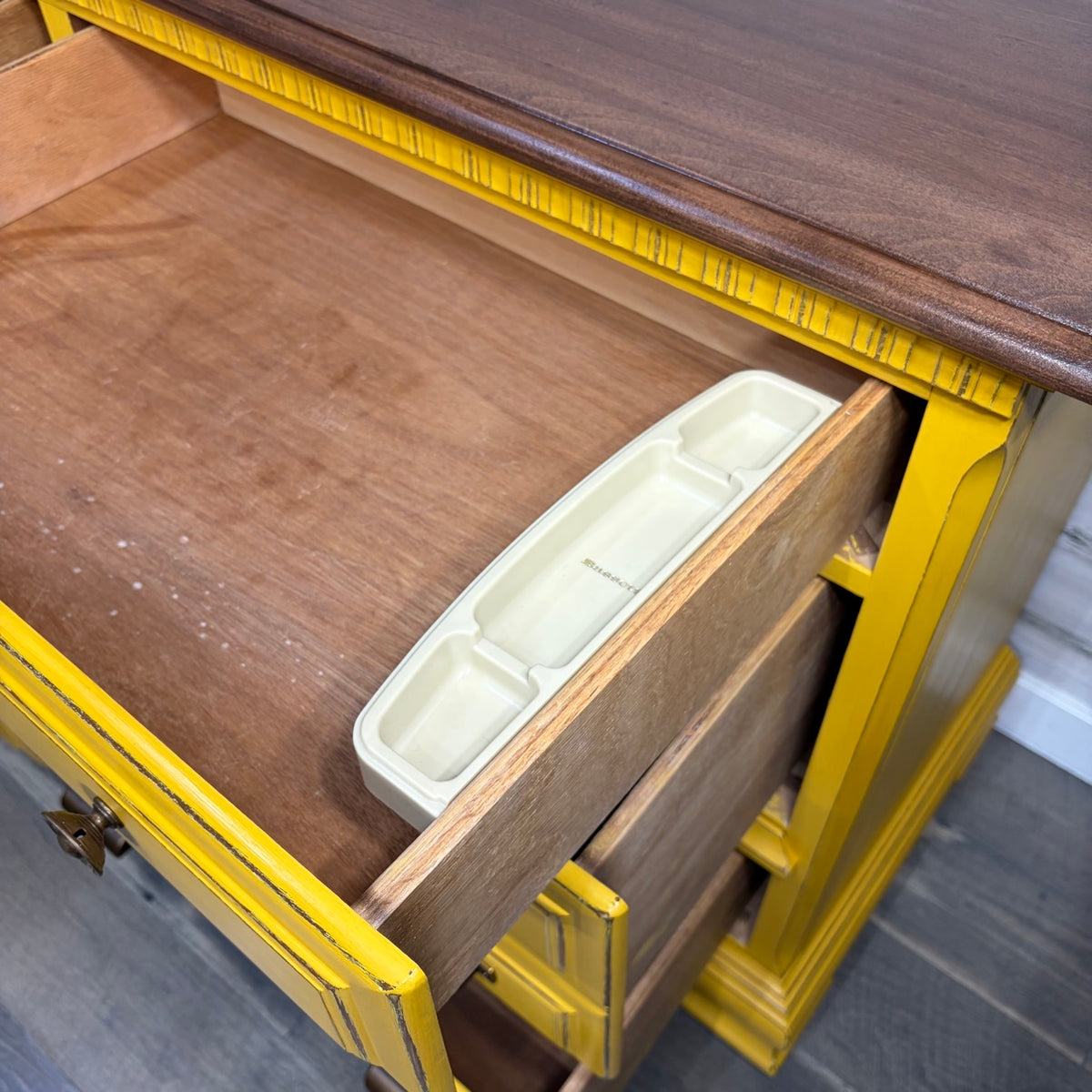 Drawer open showing Bassett organizer tray