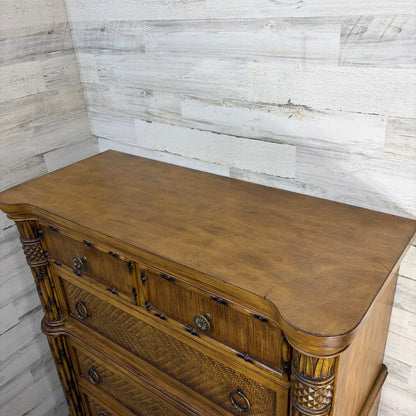 Compass-rose medallion closeup showing minor edge wear on nightstand top