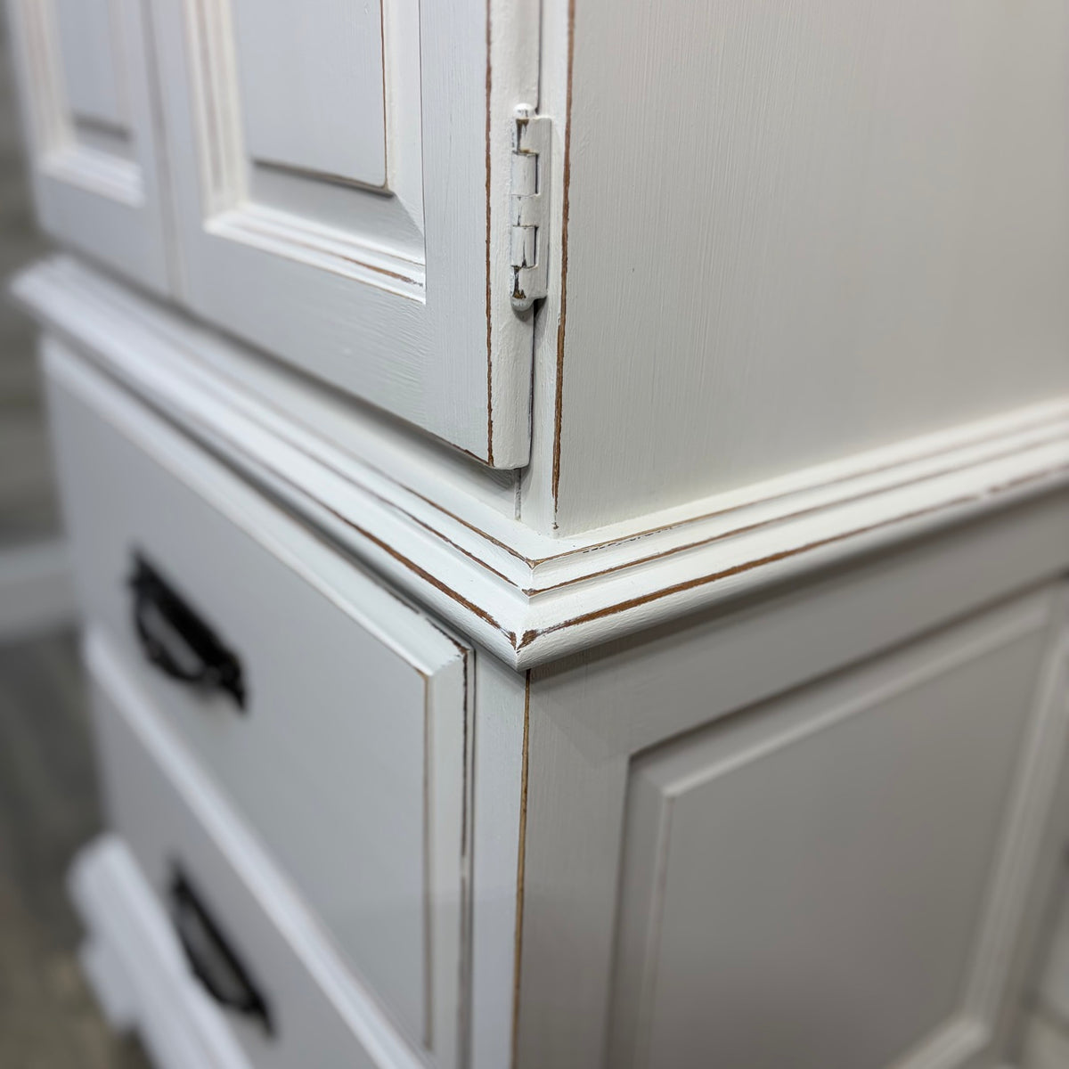 light distressing detail on cabinet corner