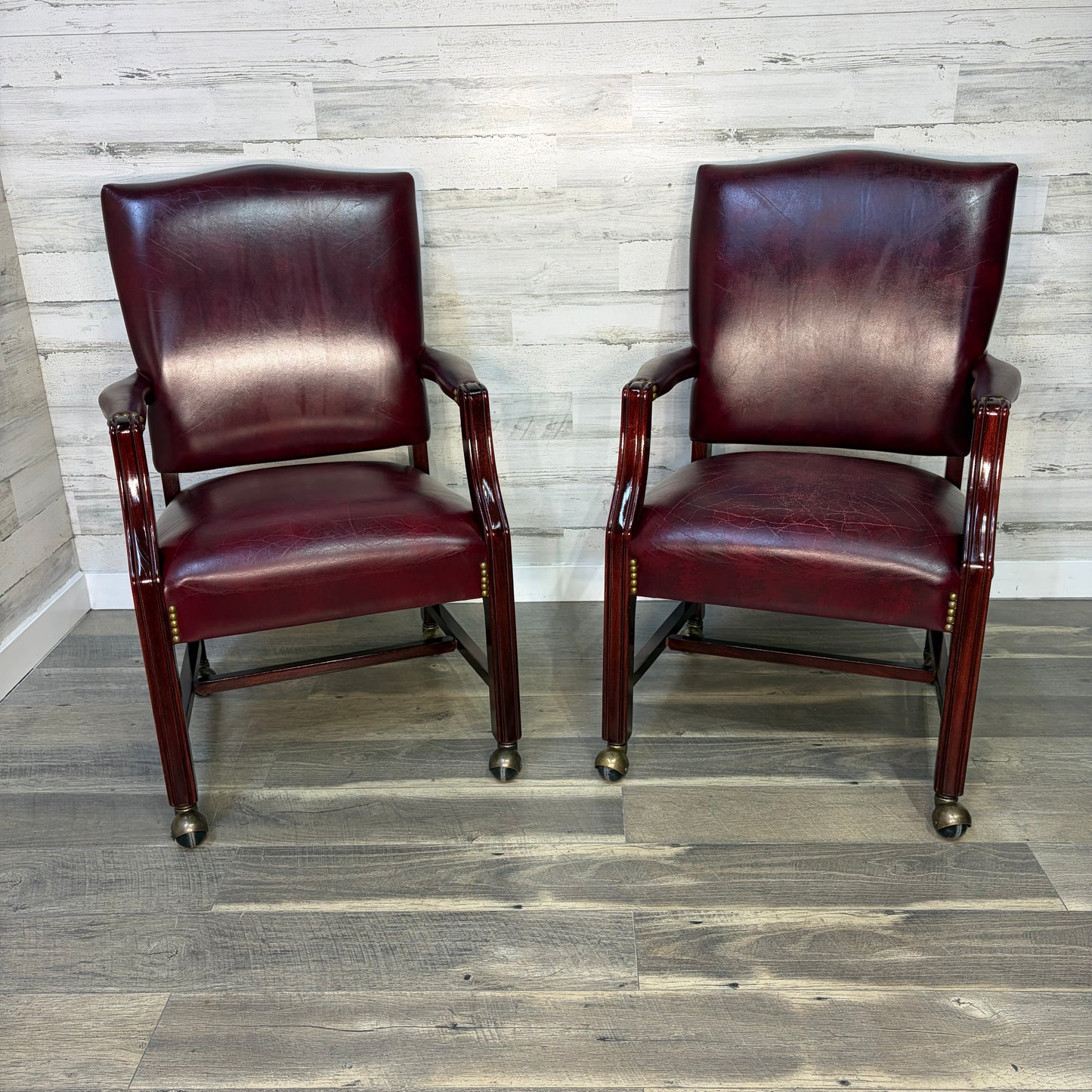Set Of 2 Red Leather Accent Chairs On Wheels