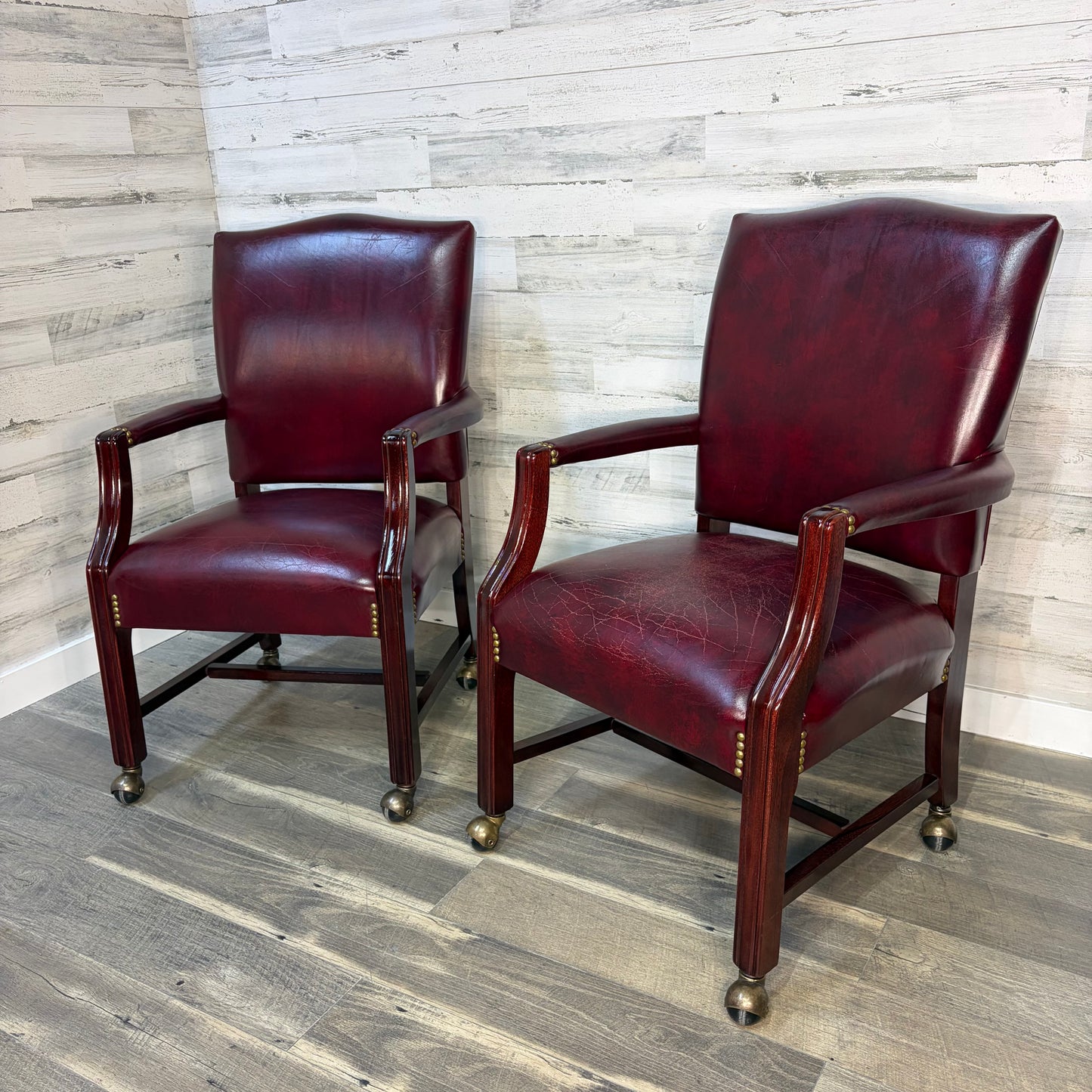 Set Of 2 Red Leather Accent Chairs On Wheels