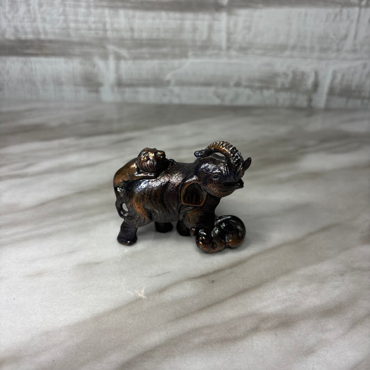 Lion Attack Elephant Figurine