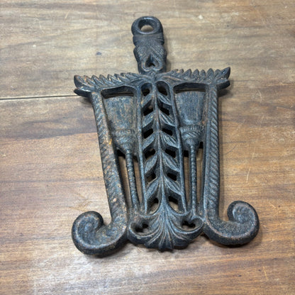 Vintage Cast Iron Trivet Broom And Wheat Design