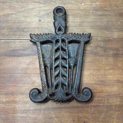 Vintage Cast Iron Trivet Broom And Wheat Design