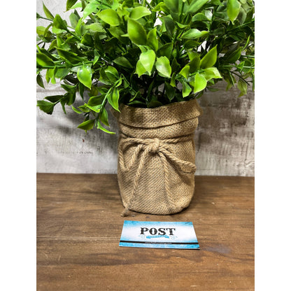 Faux Leafy Plant In Burlap Pot