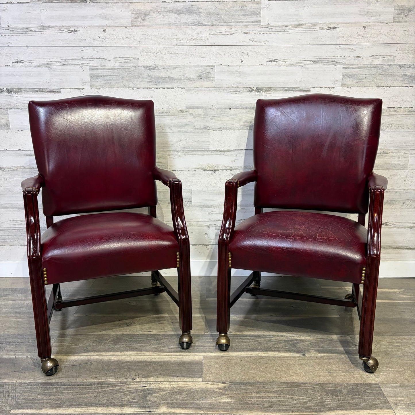 Set Of 2 Red Leather Accent Chairs On Wheels