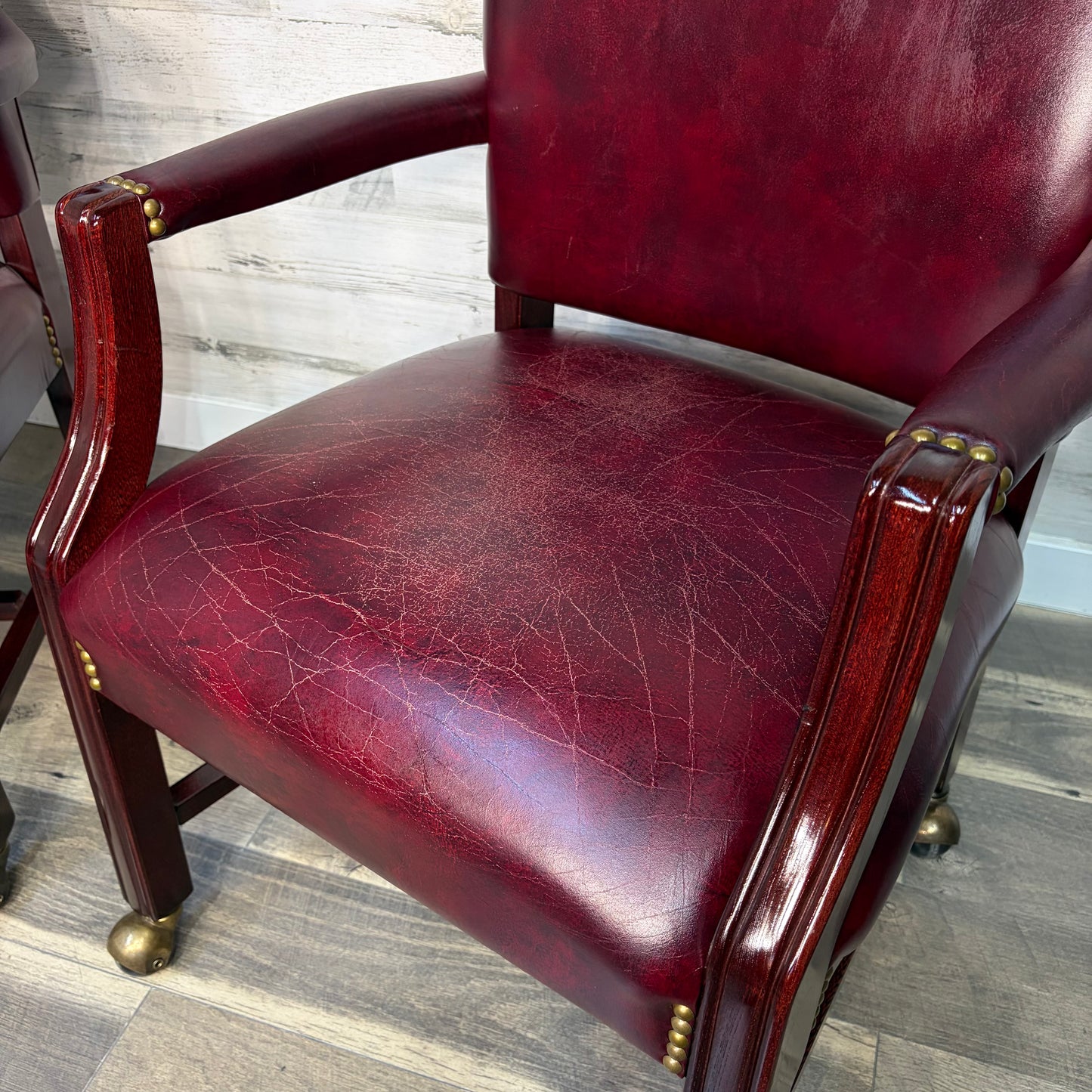 Set Of 2 Red Leather Accent Chairs On Wheels