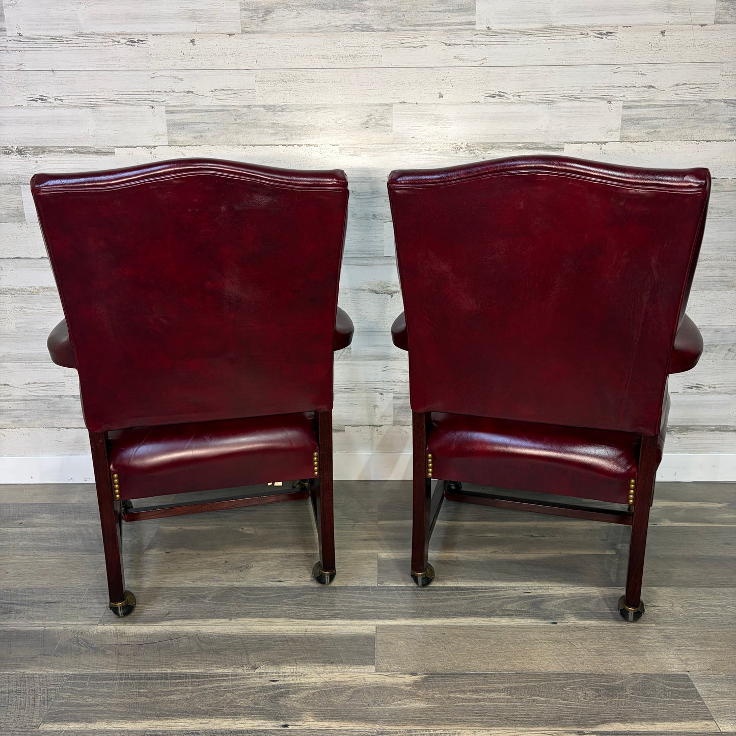 Set Of 2 Red Leather Accent Chairs On Wheels