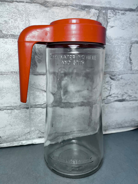 Vintage TANG glass pitcher