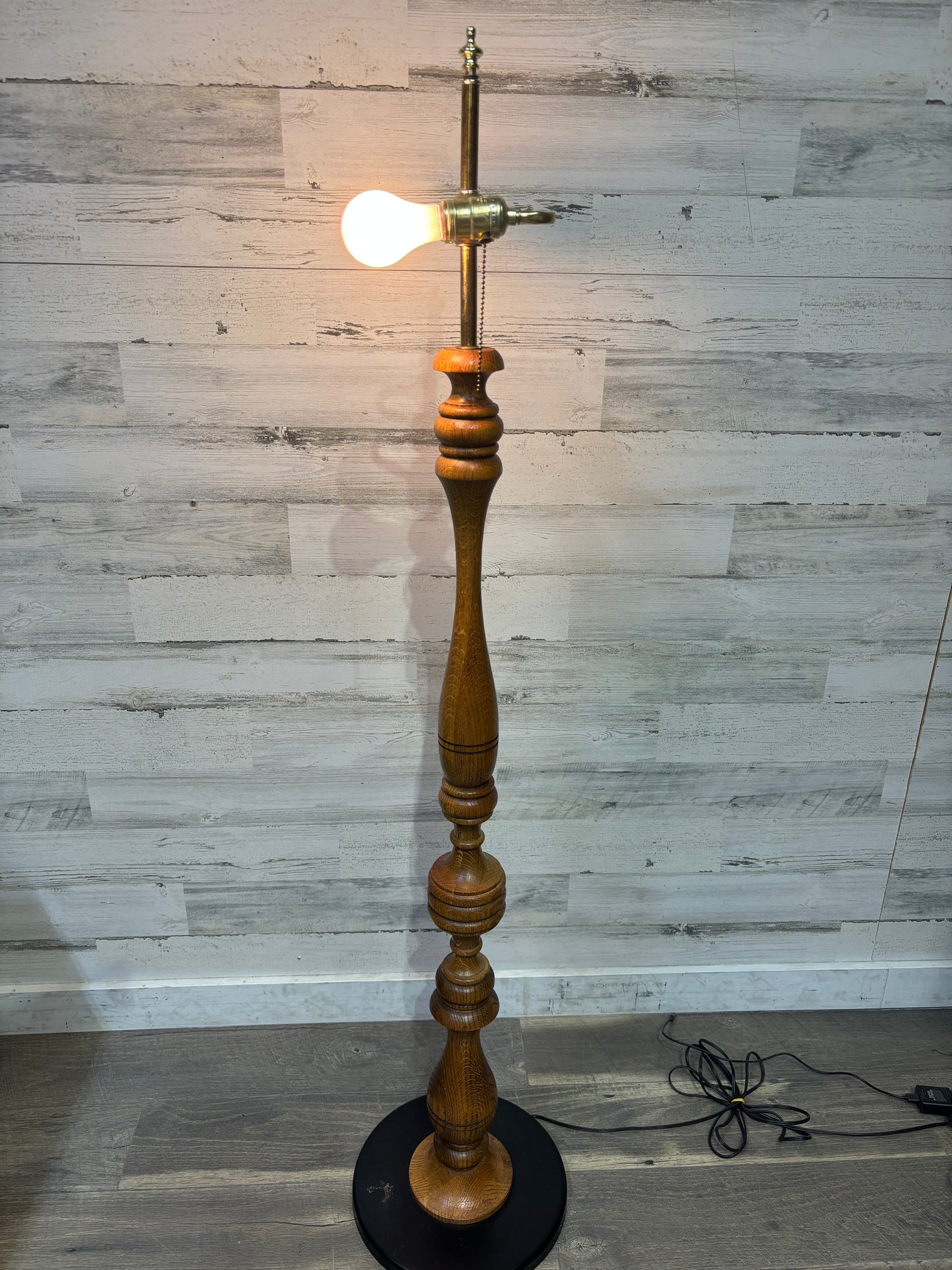 Mid century carved oak floor lamp
