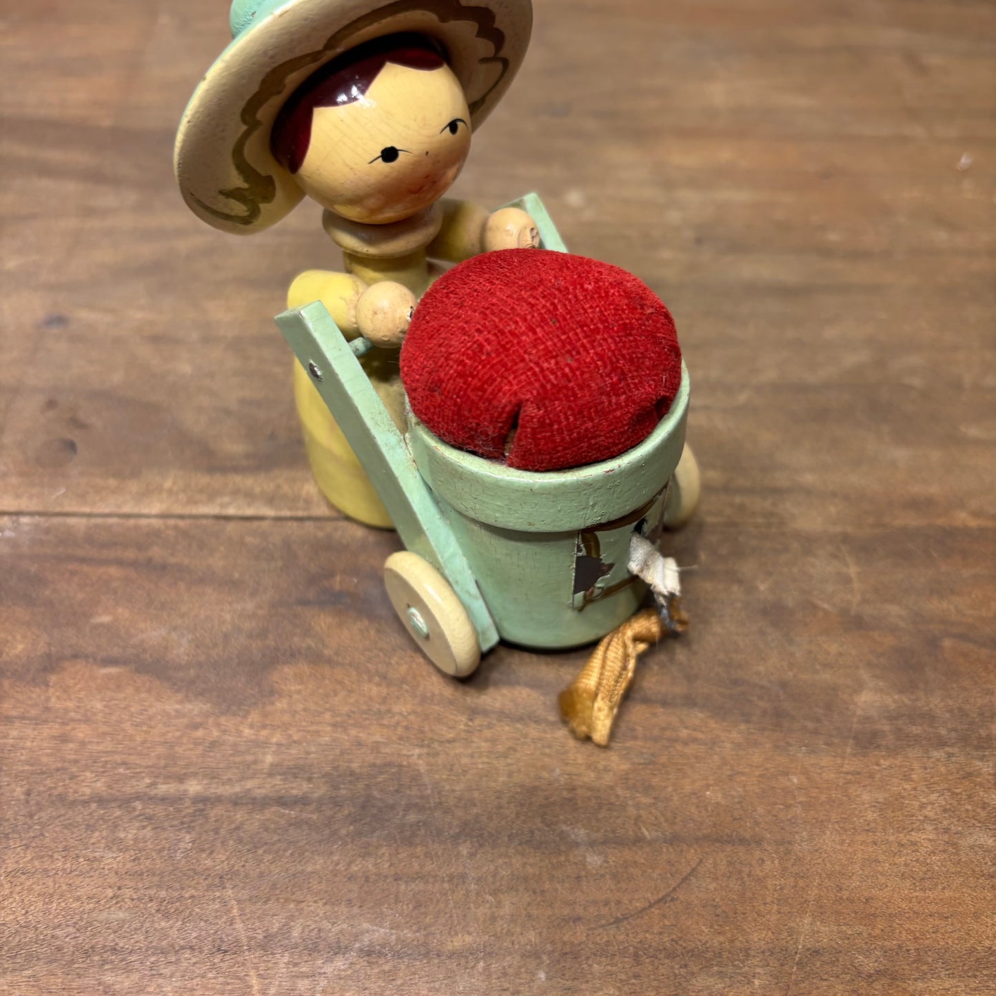 Vintage Wood Figure Pushing Cart Pin Cushion Tape Measure