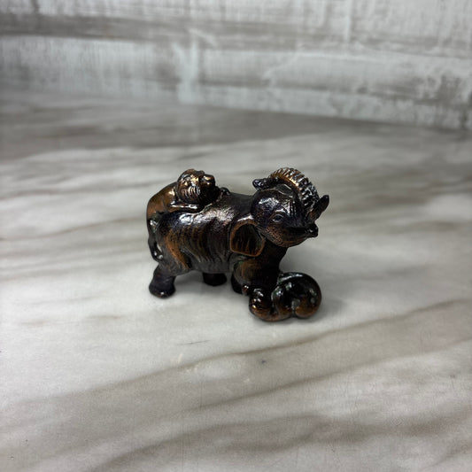 Lion Attack Elephant Figurine