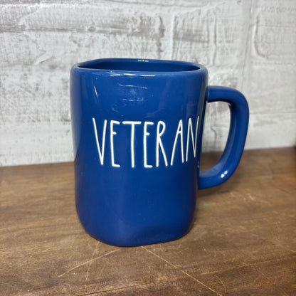 Rae Dunn “Veteran” Blue Mug