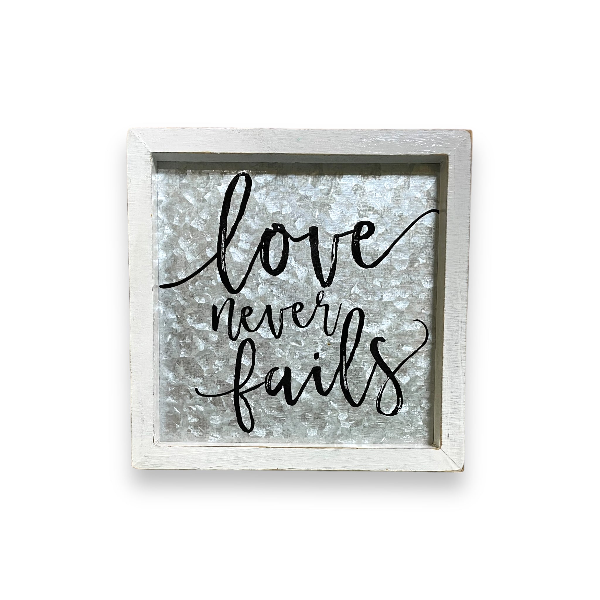 “Love Never Fails” Sign