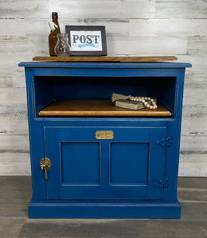 Navy Blue “White Clad” Cabinet