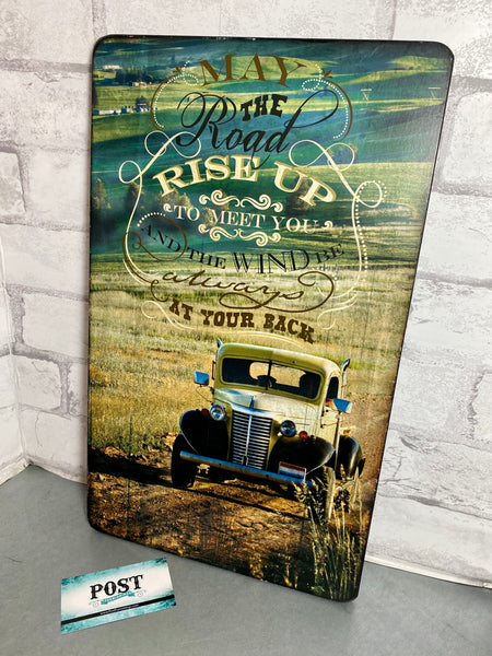 “May The Road Rise” sign